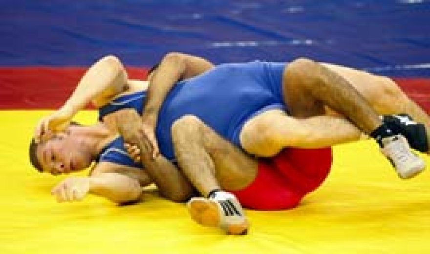 Wrestling: Dykun delivers rapid gold