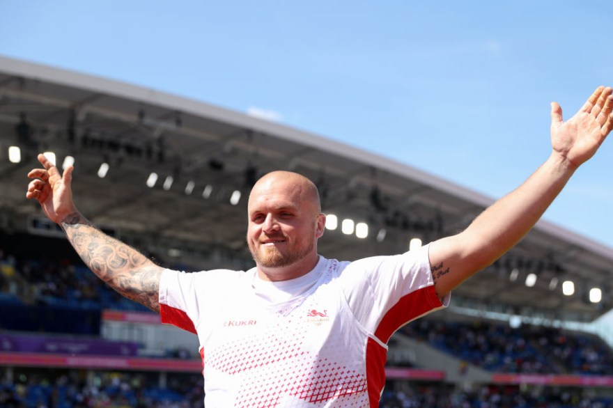 Miller recovers to defend hammer title