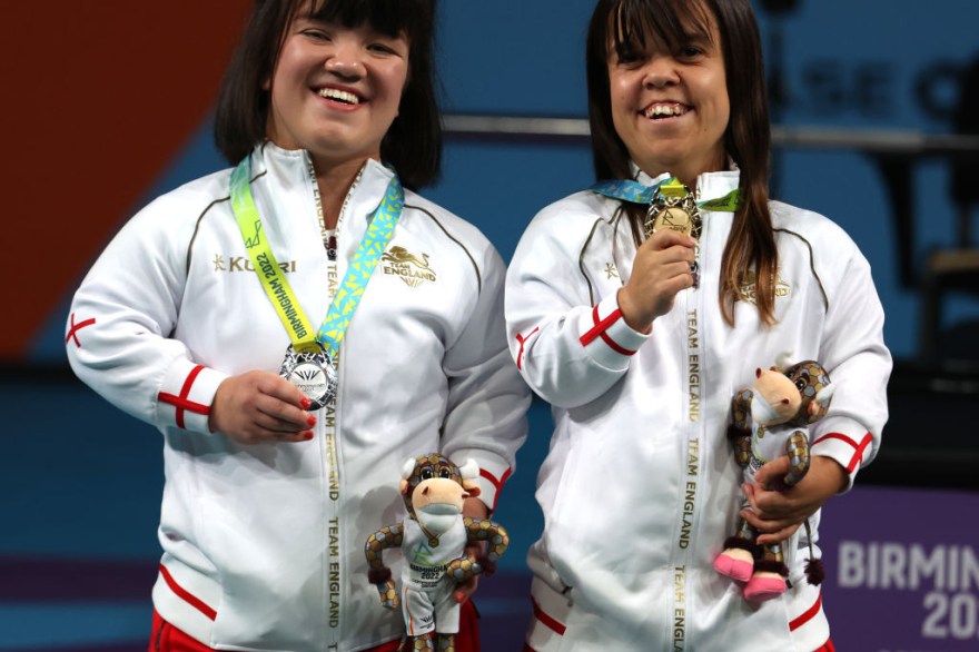 Powerlifters make history in triple medal haul